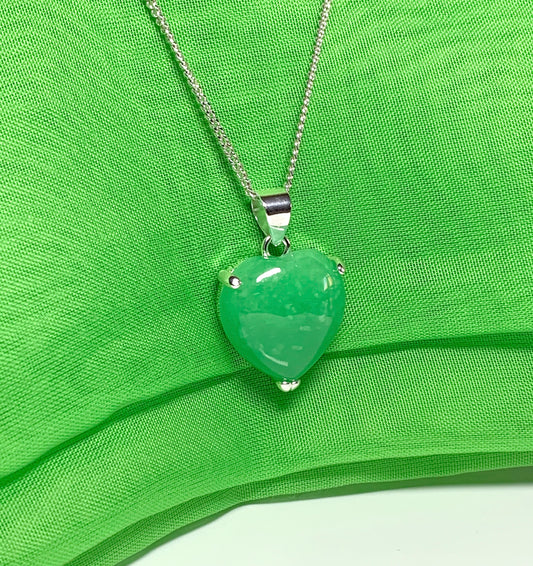 A stunning real green jade necklace heart shaped sterling silver pendant