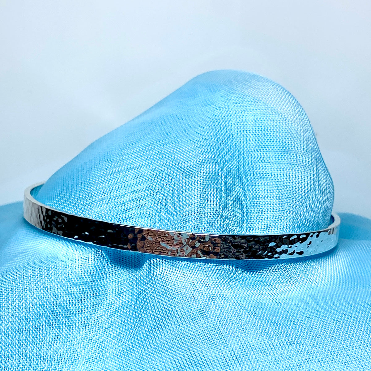 Oval shaped bangle hammered patterned solid sterling silver
