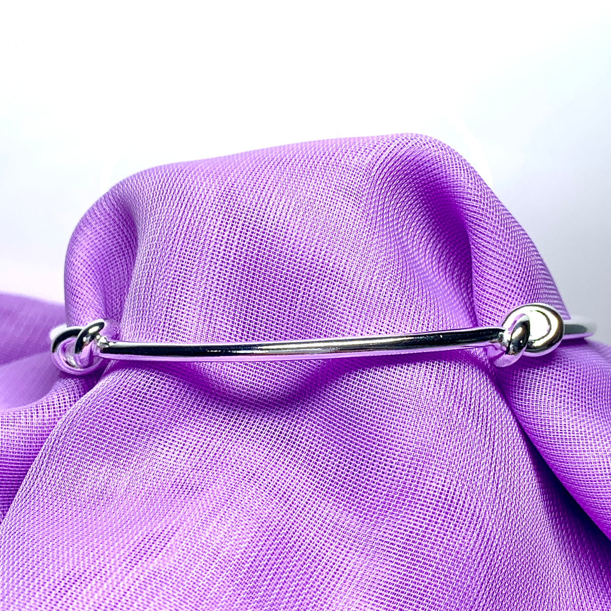 Bangle sterling silver knotted solid round with a classic knot design