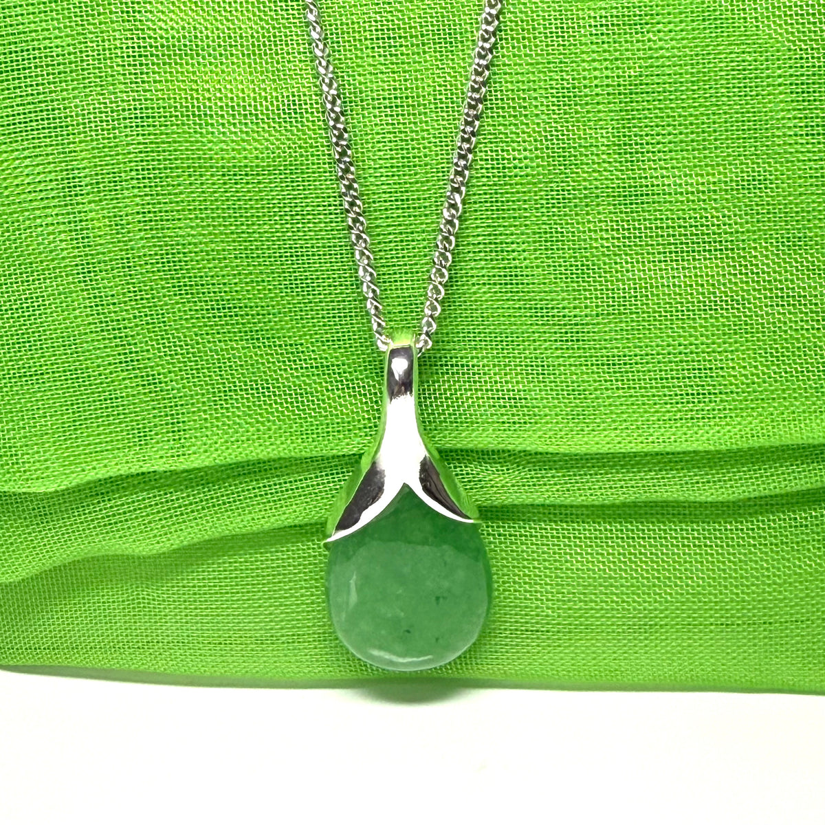 Beautiful and stunning real green jade pendant necklace in a teardrop shape, exquisite and timeless