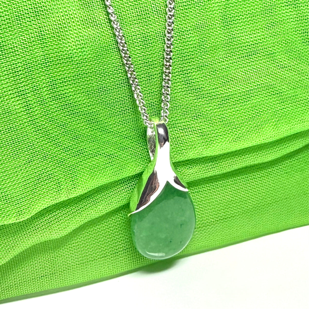 Beautiful and stunning real green jade pendant necklace in a teardrop shape, exquisite and timeless