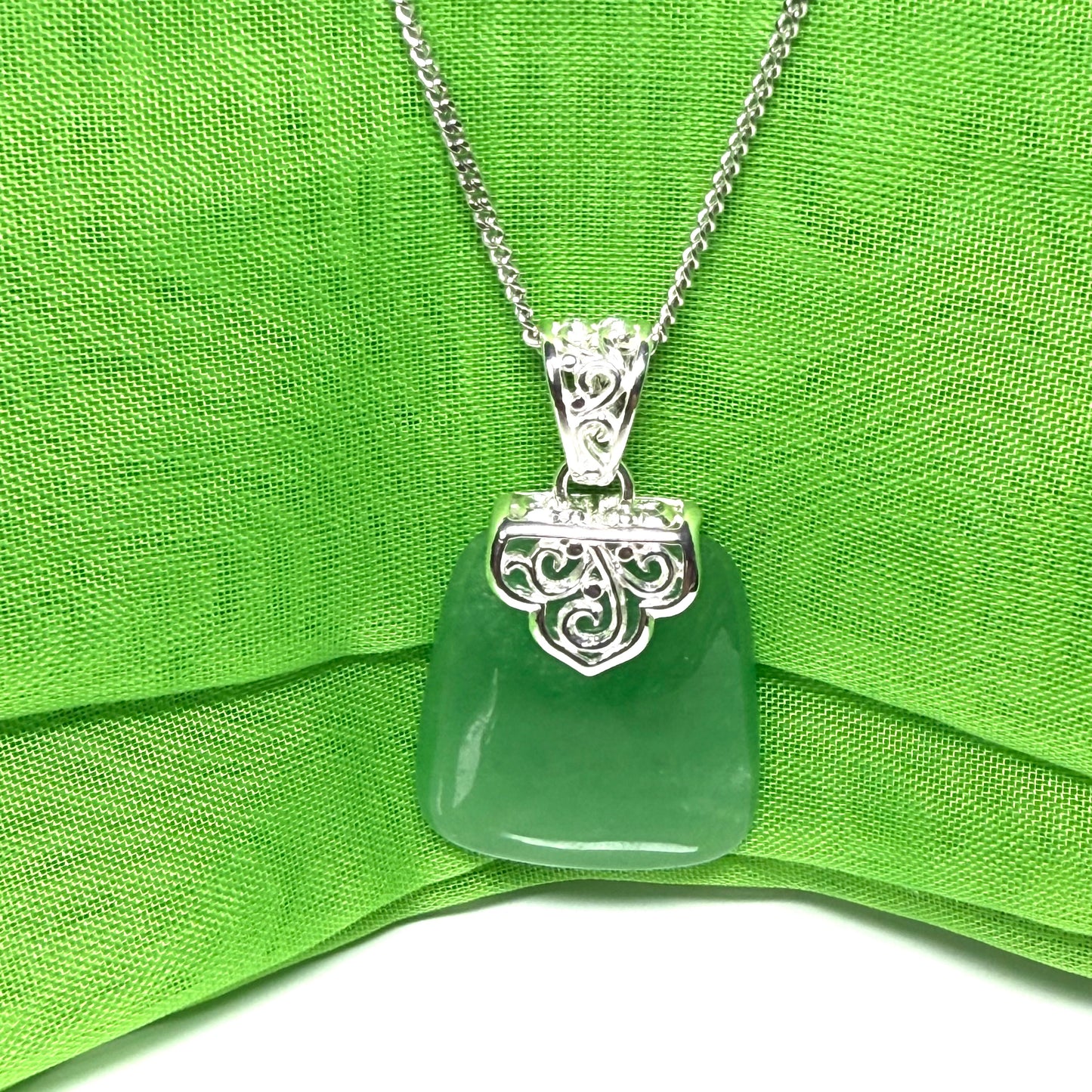 Beautiful and timeless real green jade necklace large cushion shaped with a chain