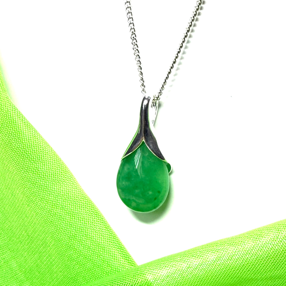 Beautiful and stunning real green jade pendant necklace in a teardrop shaped or pear shaped
