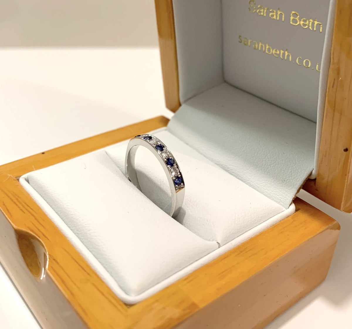 Blue Sapphire And Diamond White Gold Eternity Ring