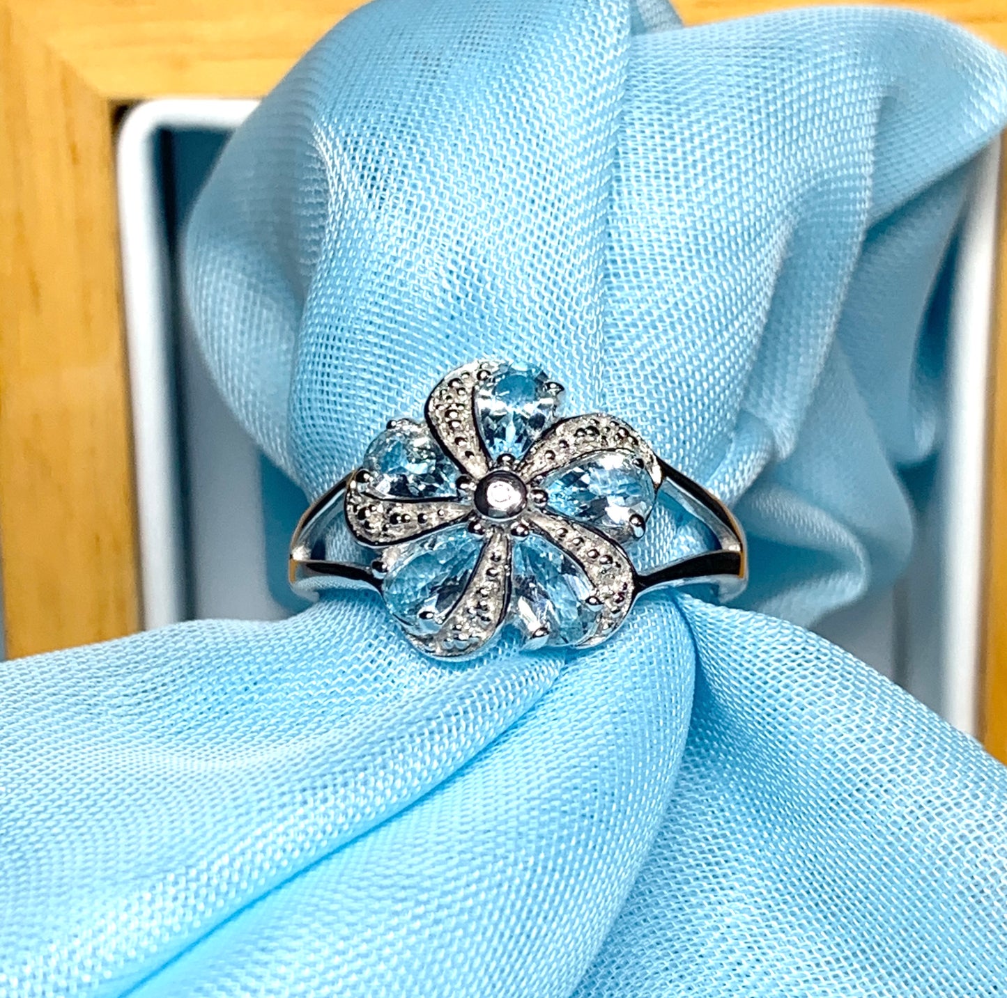 Round Blue Topaz And Diamond Sterling Silver Daisy Petal Cluster Ring