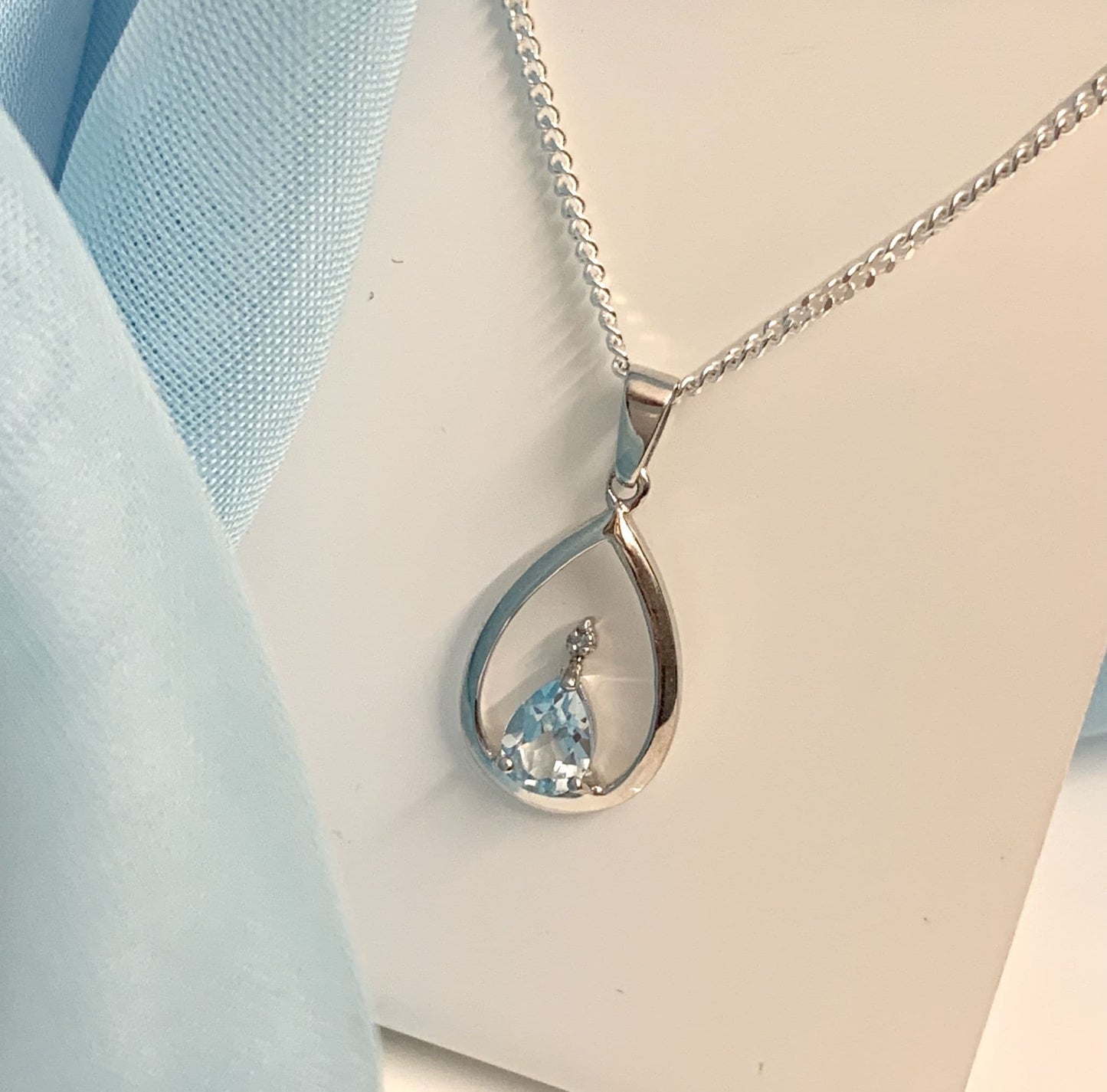 Blue Topaz Pear Shaped Sterling Silver Diamond Set Necklace Pendant