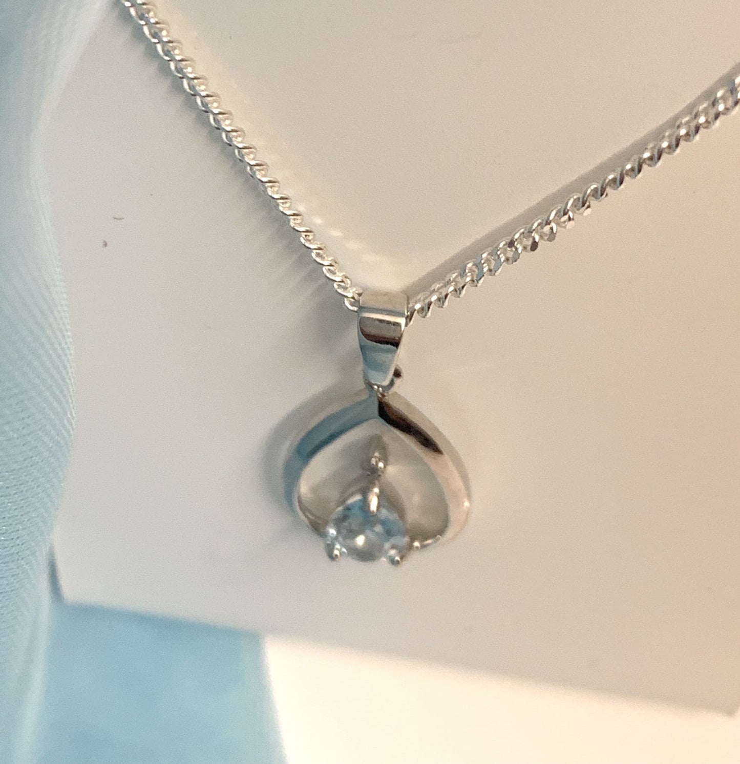 Blue Topaz Pear Shaped Sterling Silver Diamond Set Necklace Pendant