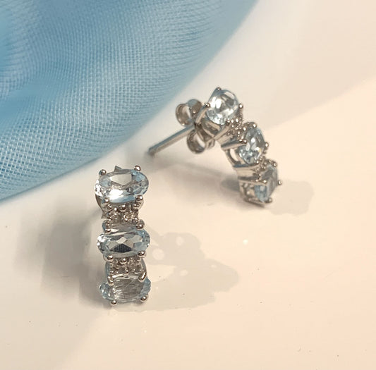 Light Blue Topaz And Diamond Curved Sterling Silver Stud Earrings