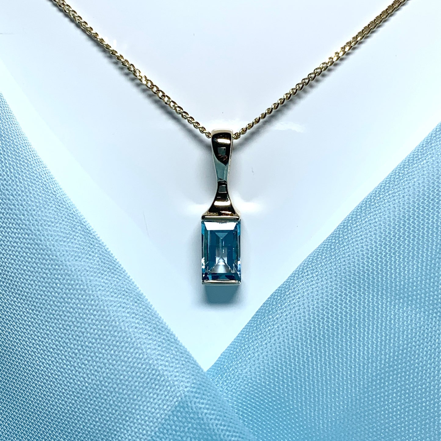 Blue Topaz necklace yellow gold square shaped pendant