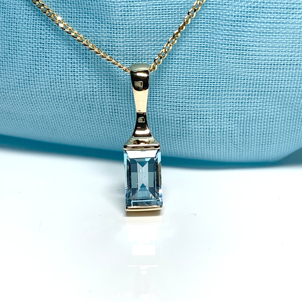 Blue Topaz necklace yellow gold square shaped pendant
