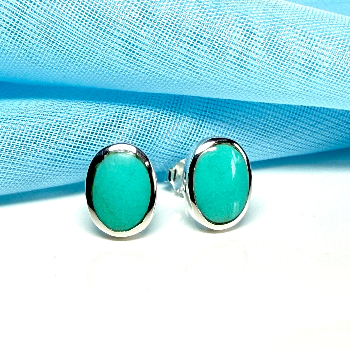 Blue sterling silver turquoise stud oval shaped earrings