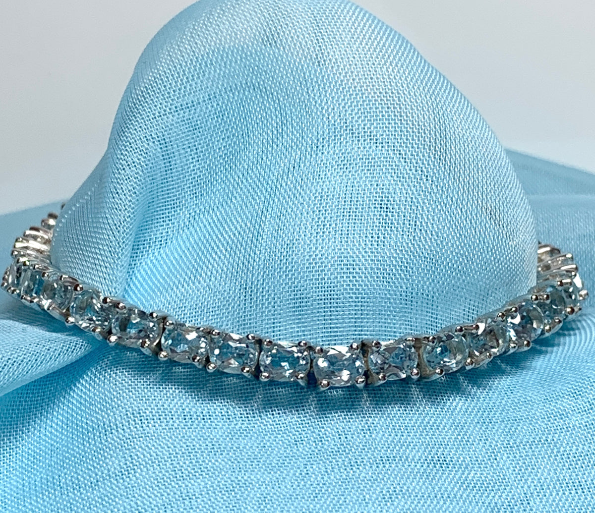 Real blue topaz bracelet oval sterling silver