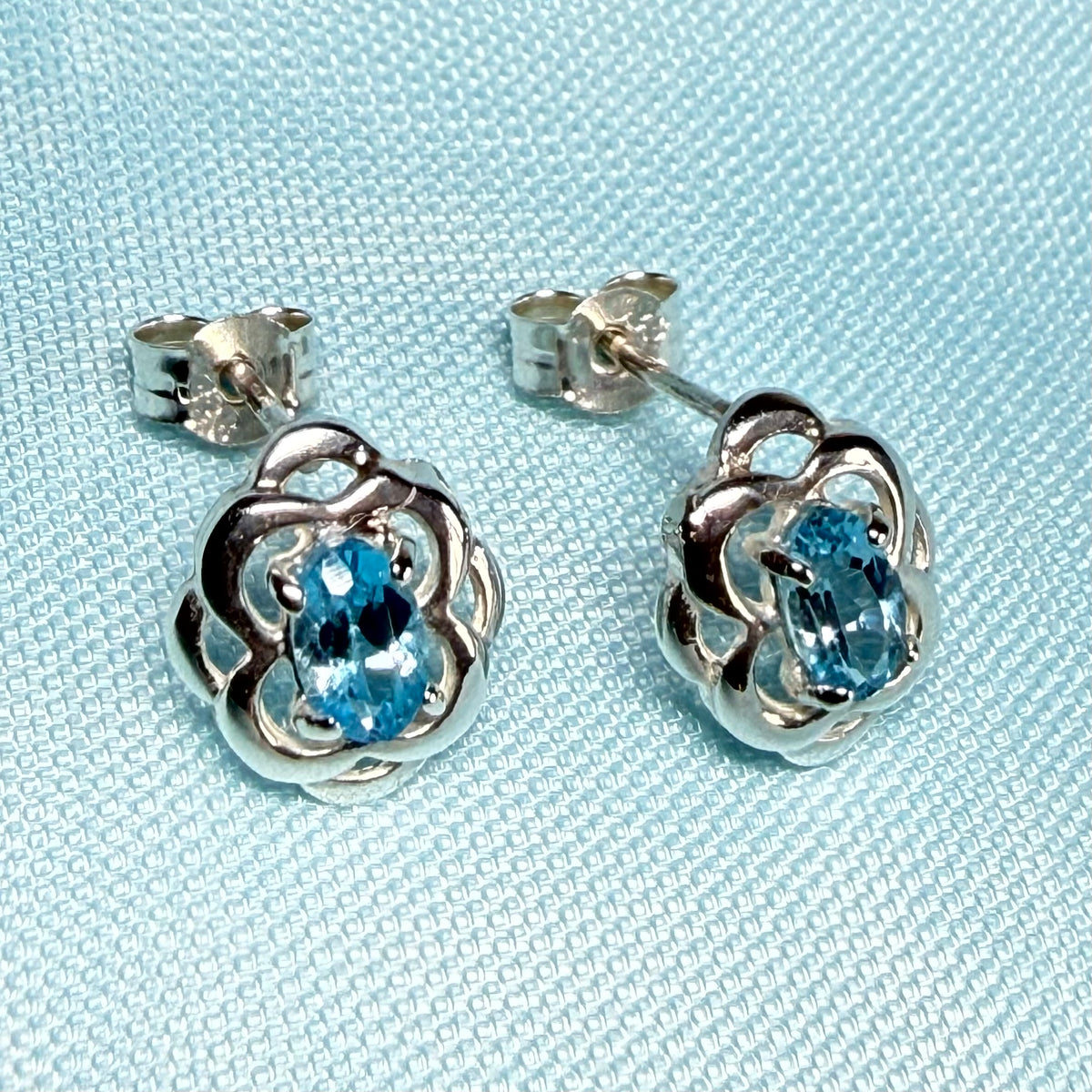 Blue topaz sterling silver oval Celtic stud earrings