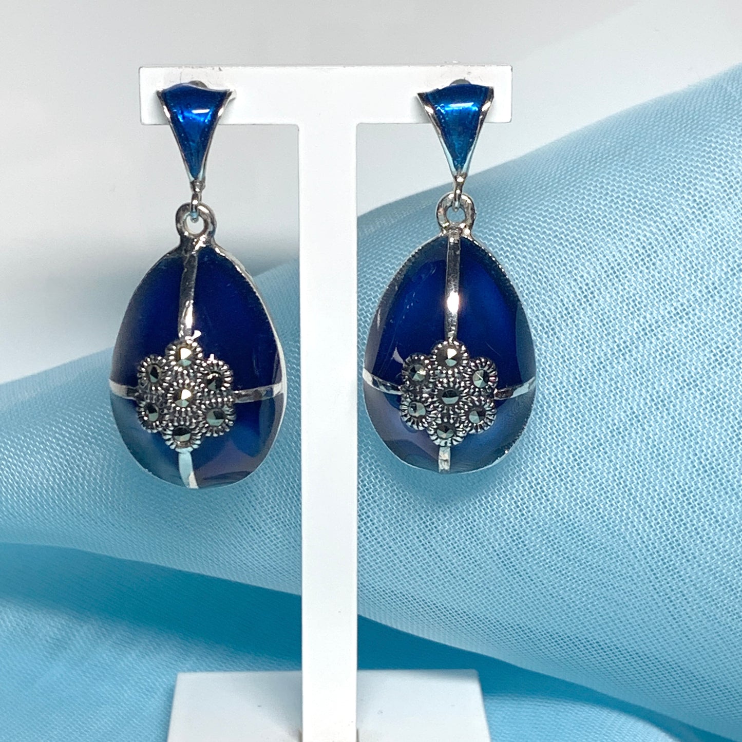 Large blue crystal drop earrings and marcasite pear teardrop