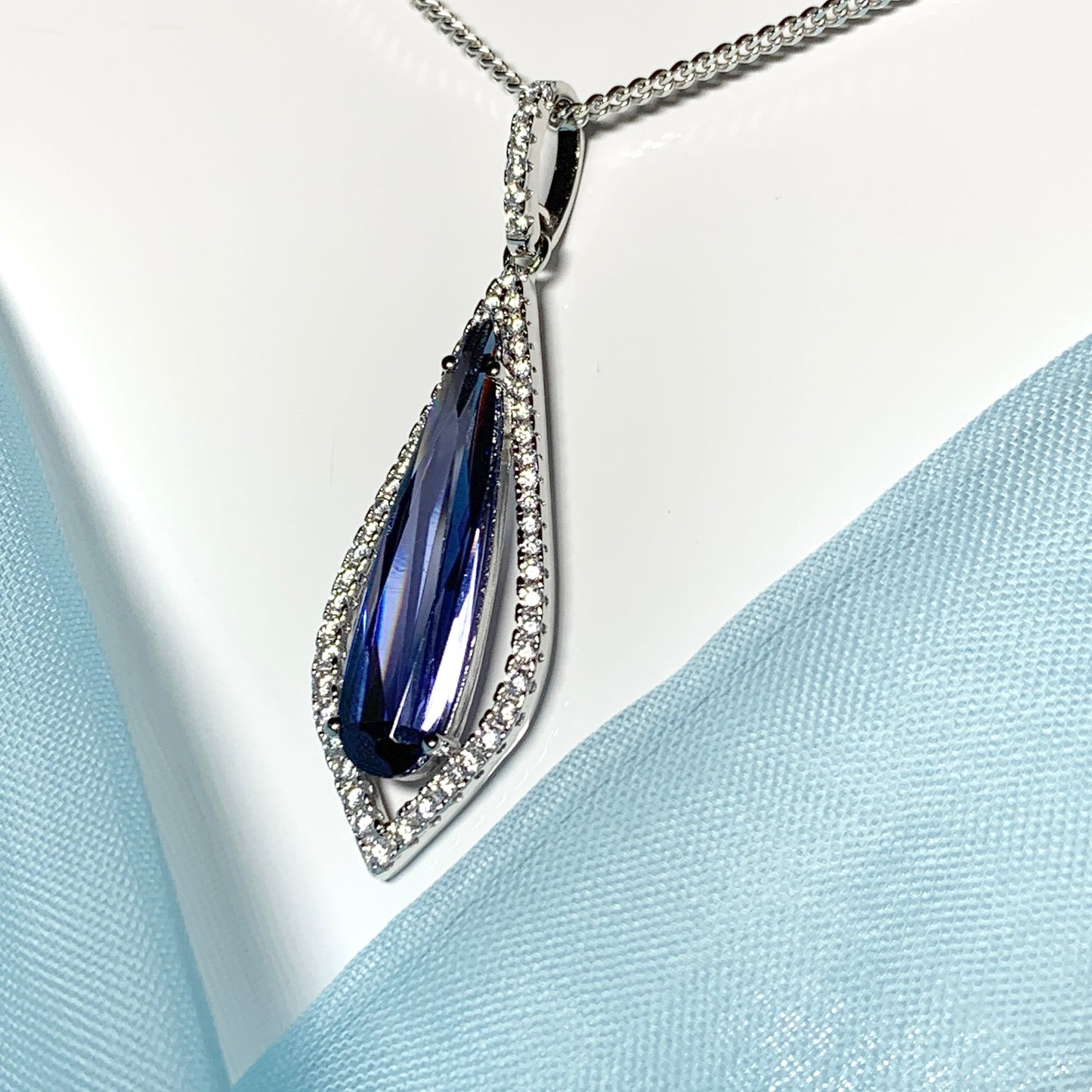 Blue long drop necklace pear shaped cubic zirconia silver cluster
