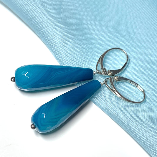 Blue long teardrop shaped agate drop earrings continental fastenings