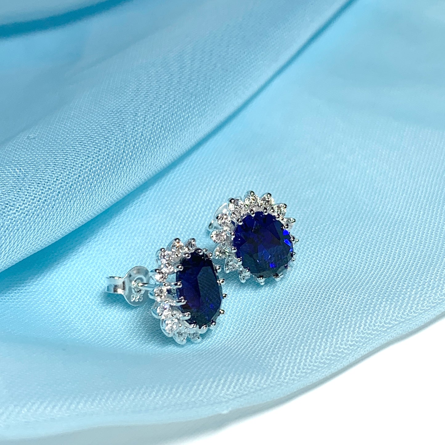 Blue oval cubic zirconia silver cluster stud earrings