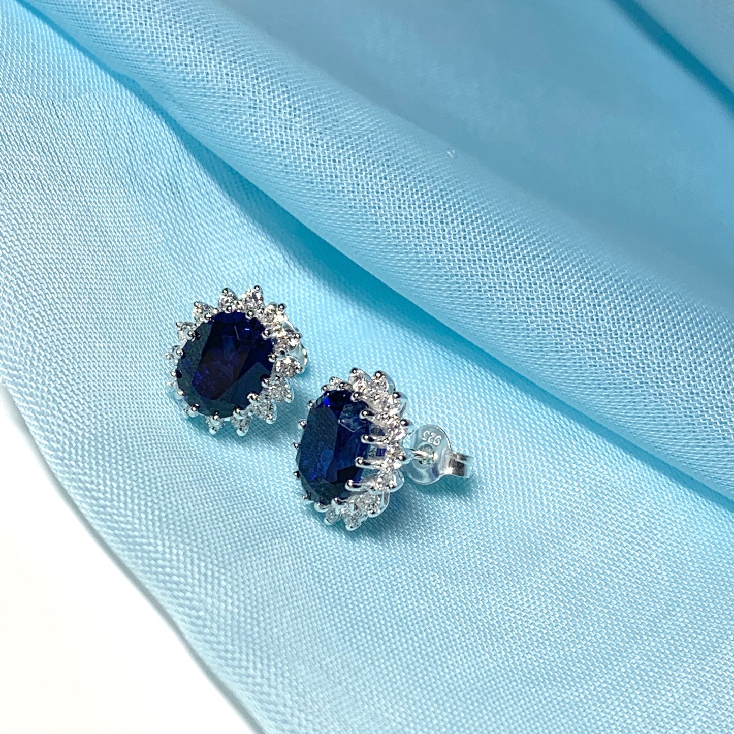 Blue oval cubic zirconia silver cluster stud earrings