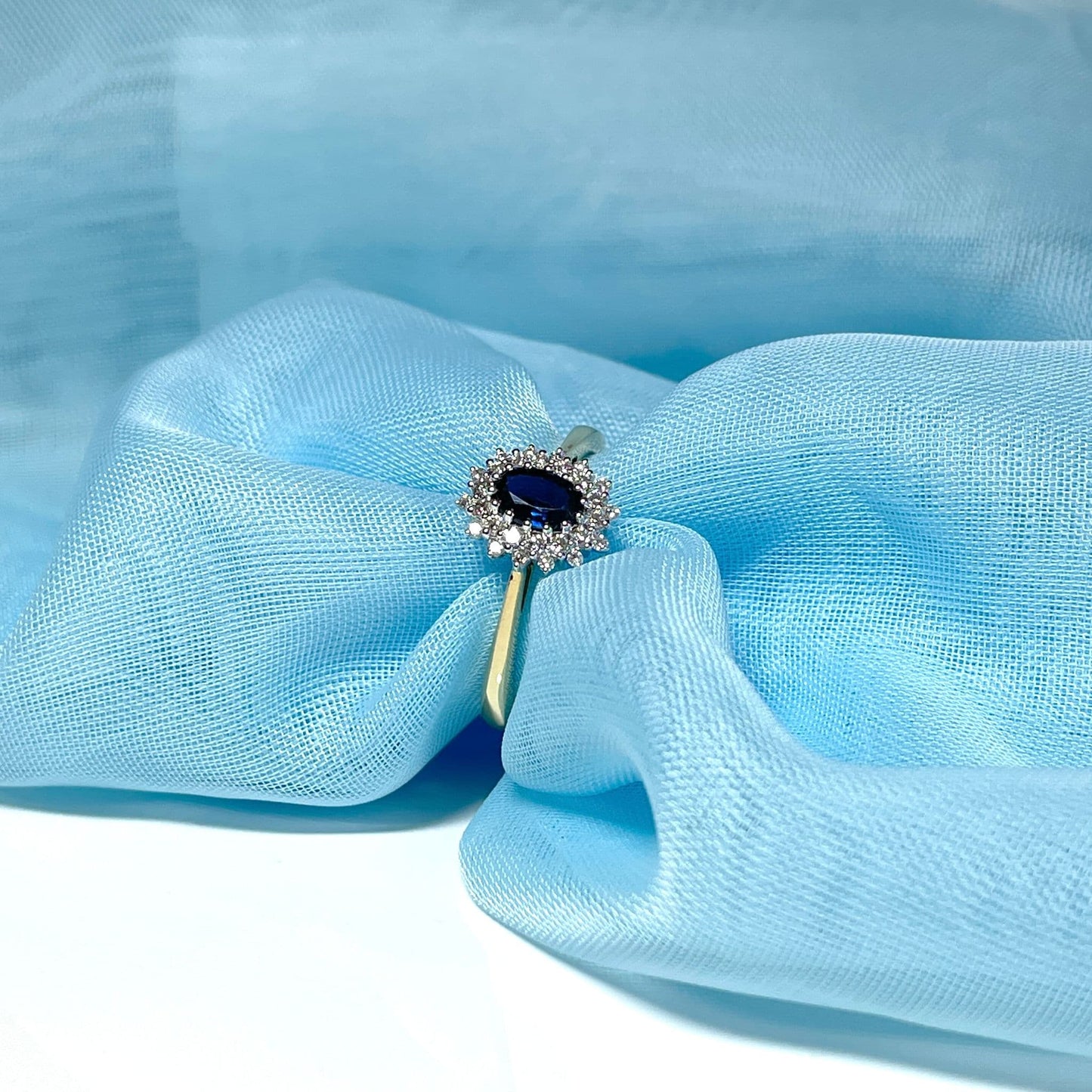 Oval Blue Sapphire and Double Diamond Yellow Gold Cluster Ring