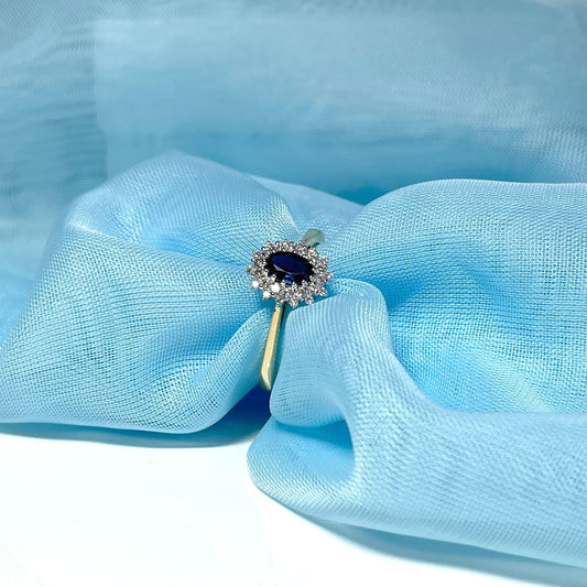 Oval Blue Sapphire and Double Diamond Yellow Gold Cluster Ring