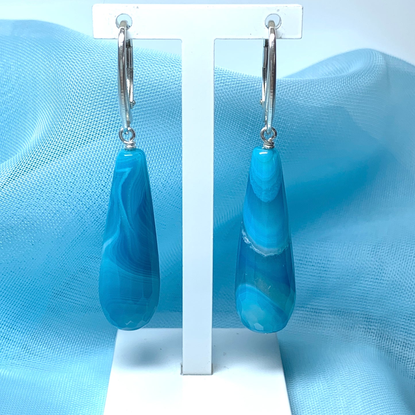 Blue teardrop drop earrings with continental wire fittings long agate stones