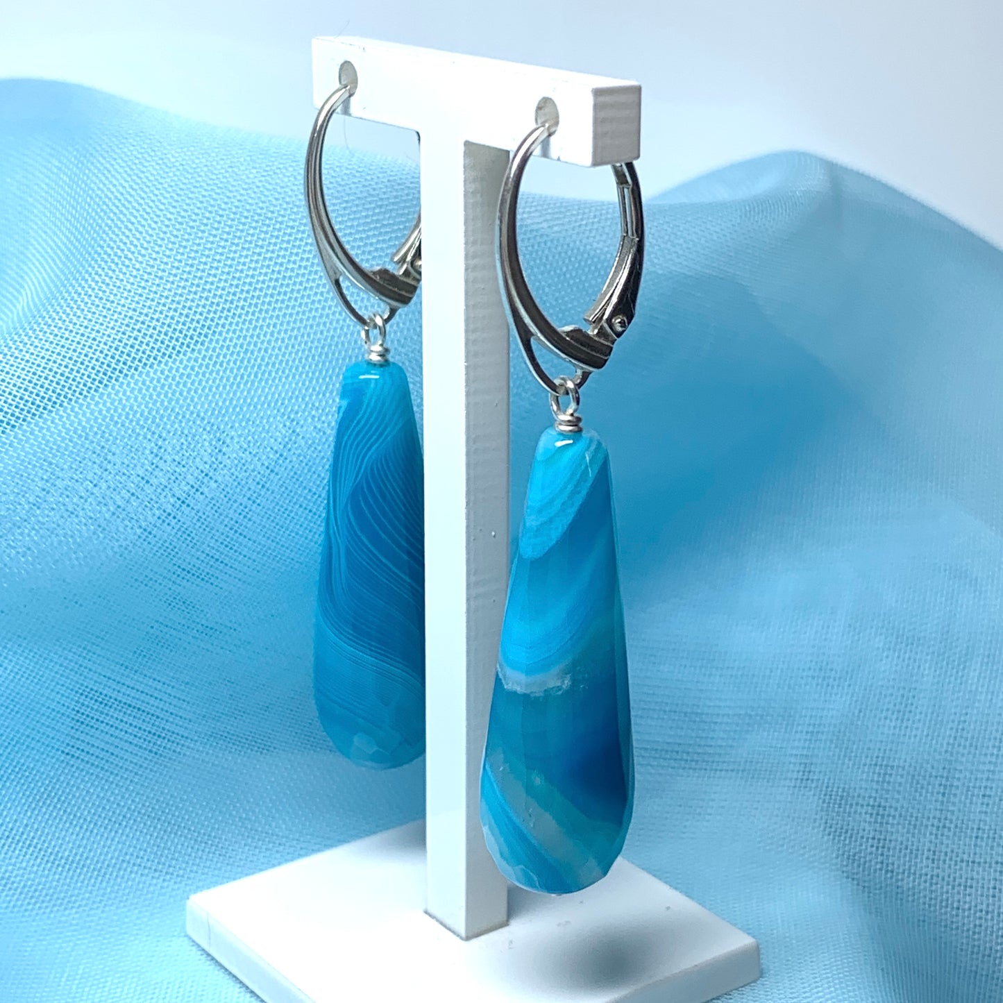 Blue teardrop drop earrings with continental wire fittings long agate stones