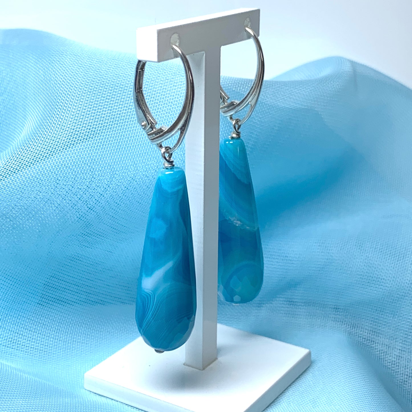 Blue teardrop drop earrings with continental wire fittings long agate stones