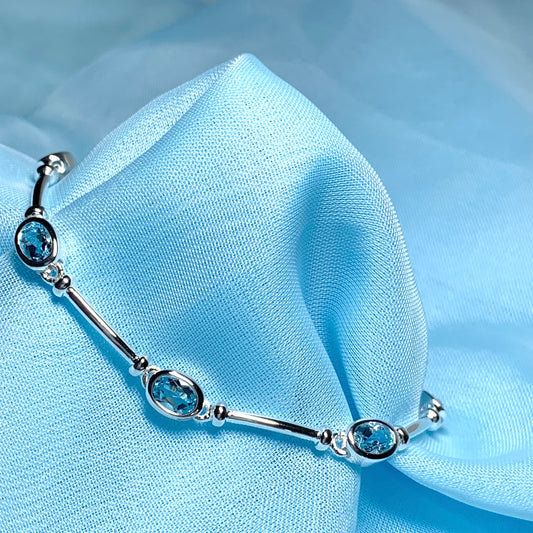 Blue topaz oval sterling silver bracelet