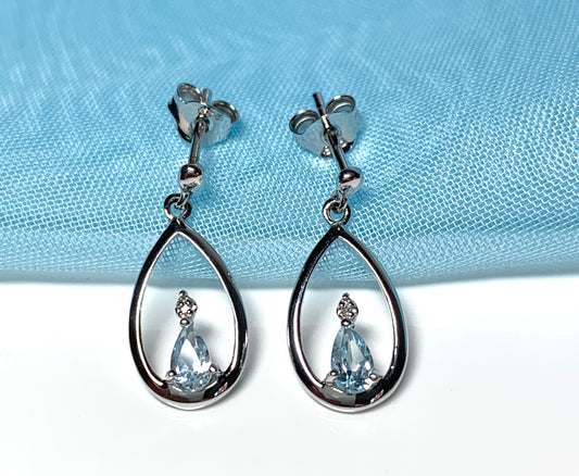 Blue topaz pear shaped sterling silver diamond set drop earrings