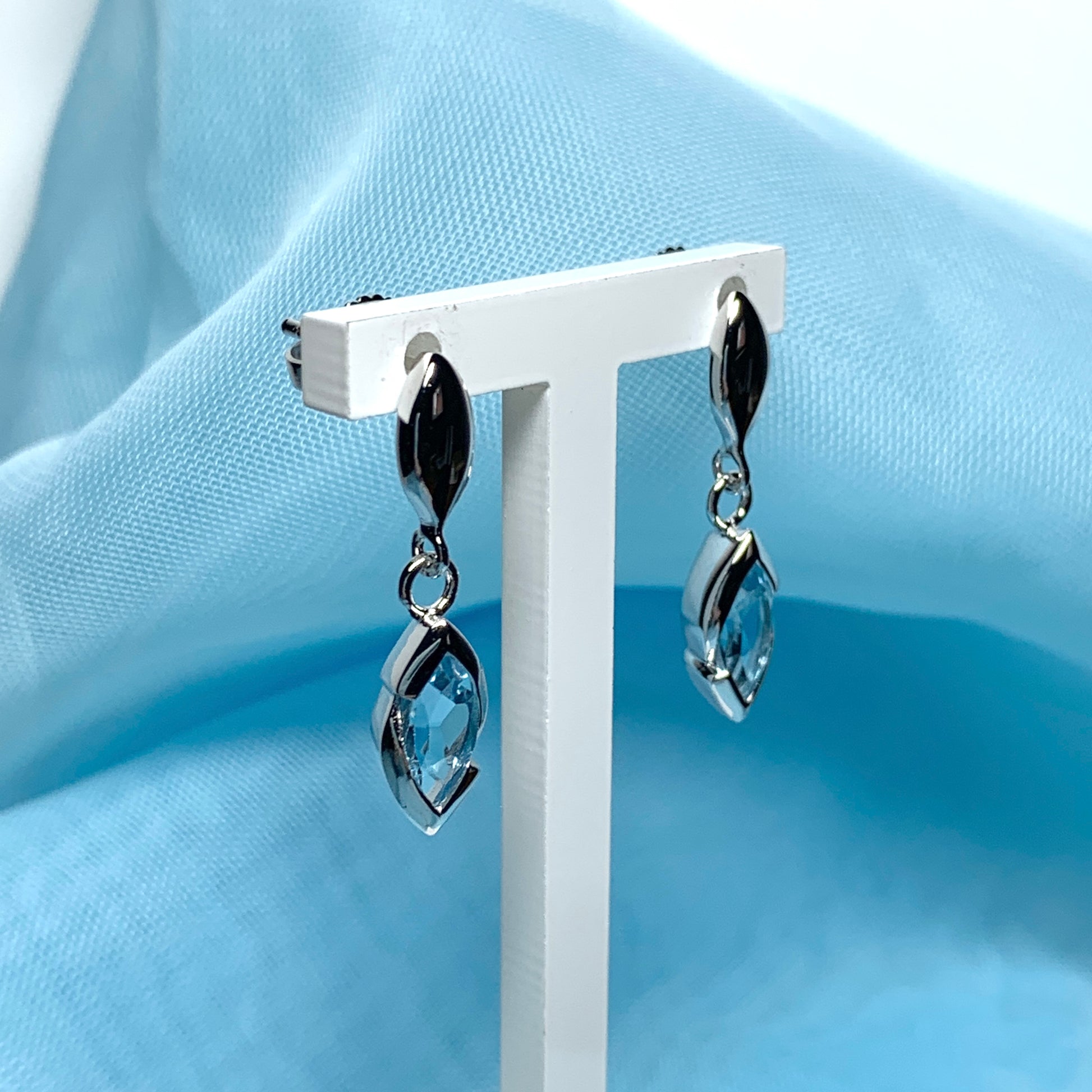 Blue topaz sterling silver marquise shaped drop earrings