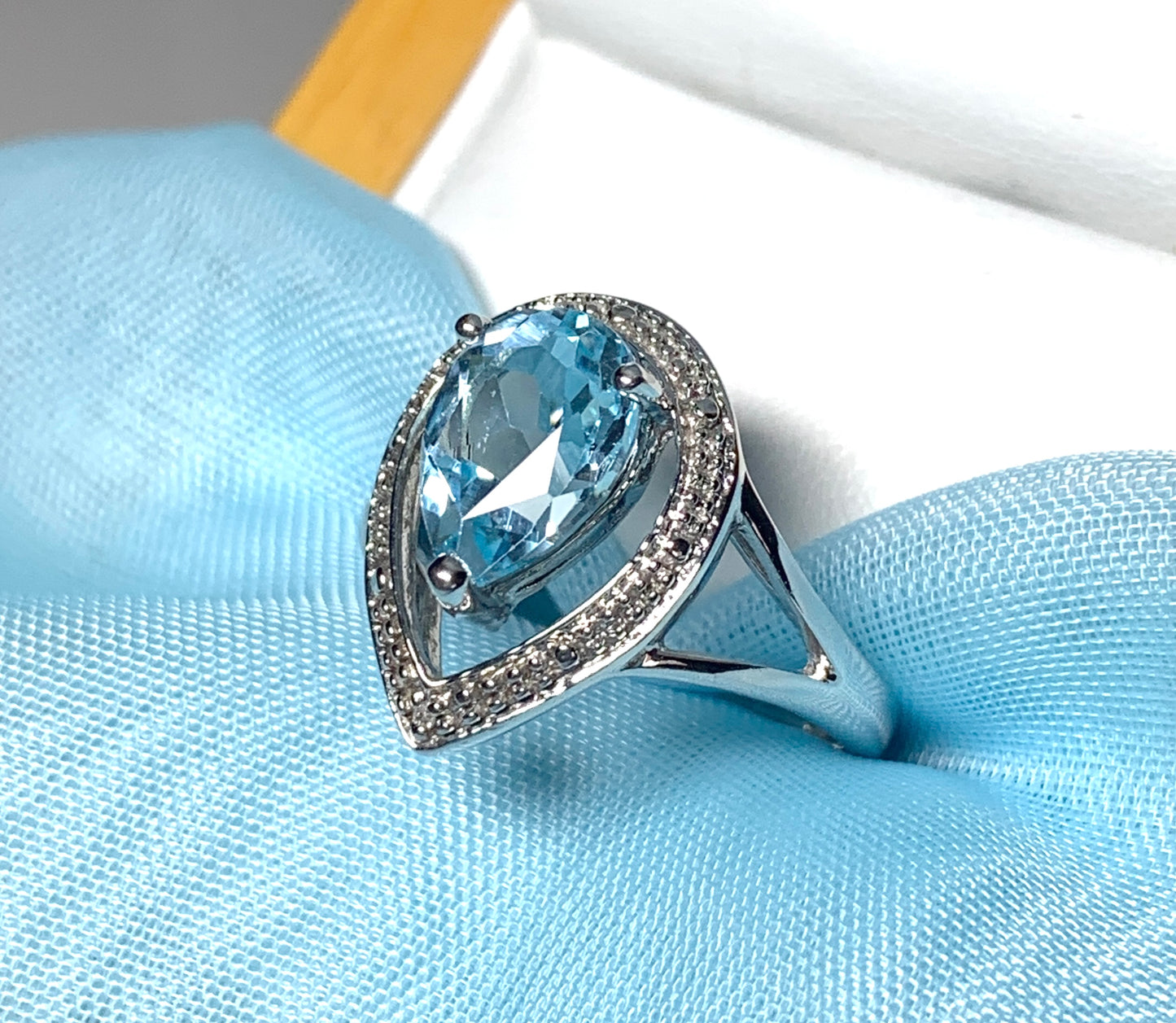 Pear shaped blue topaz sterling silver cluster ring