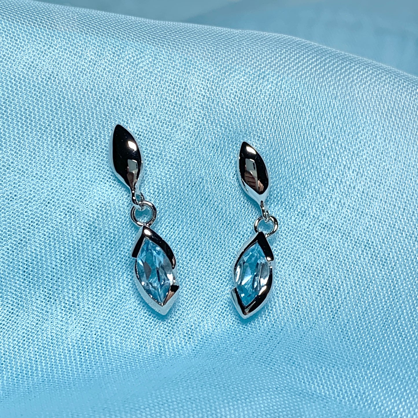 Blue topaz sterling silver marquise shaped drop earrings