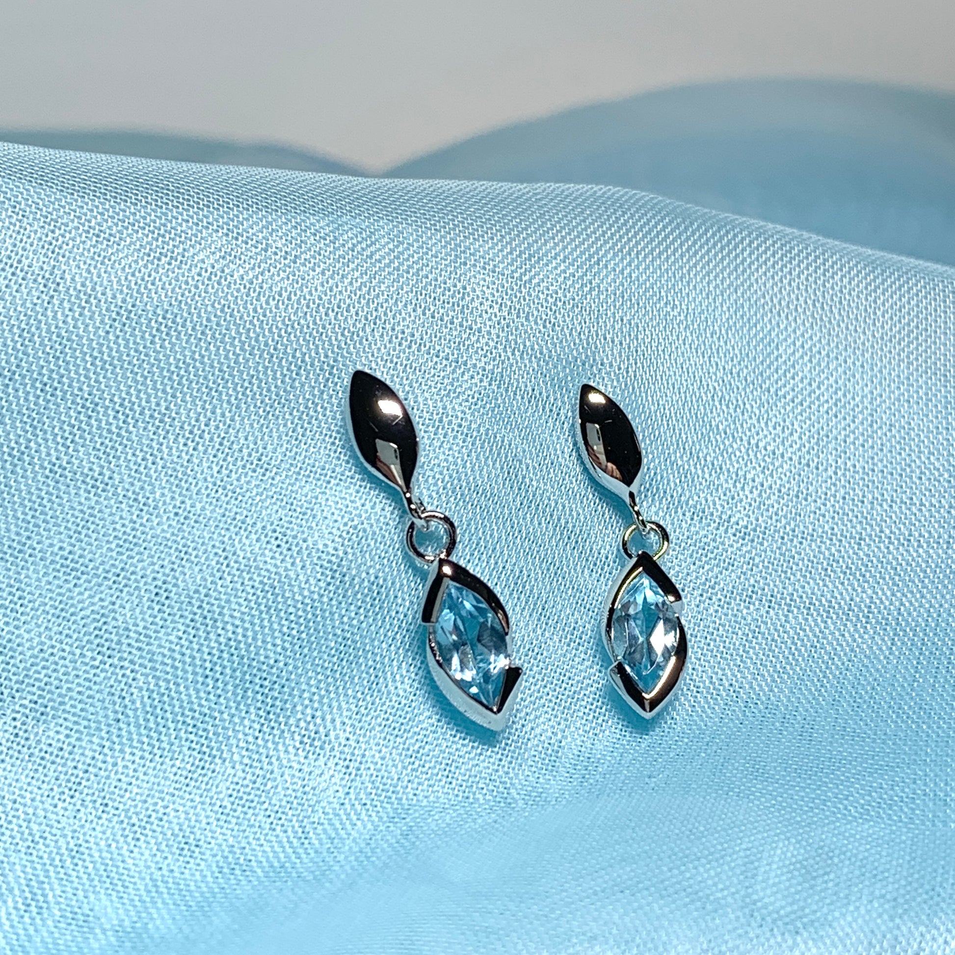 Blue topaz sterling silver marquise shaped drop earrings