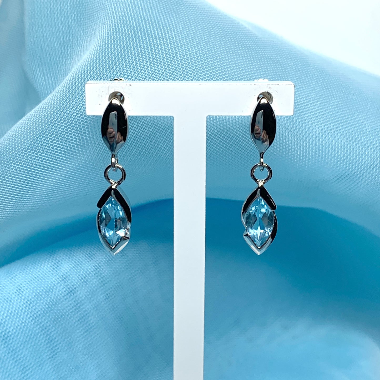 Blue topaz sterling silver marquise shaped drop earrings