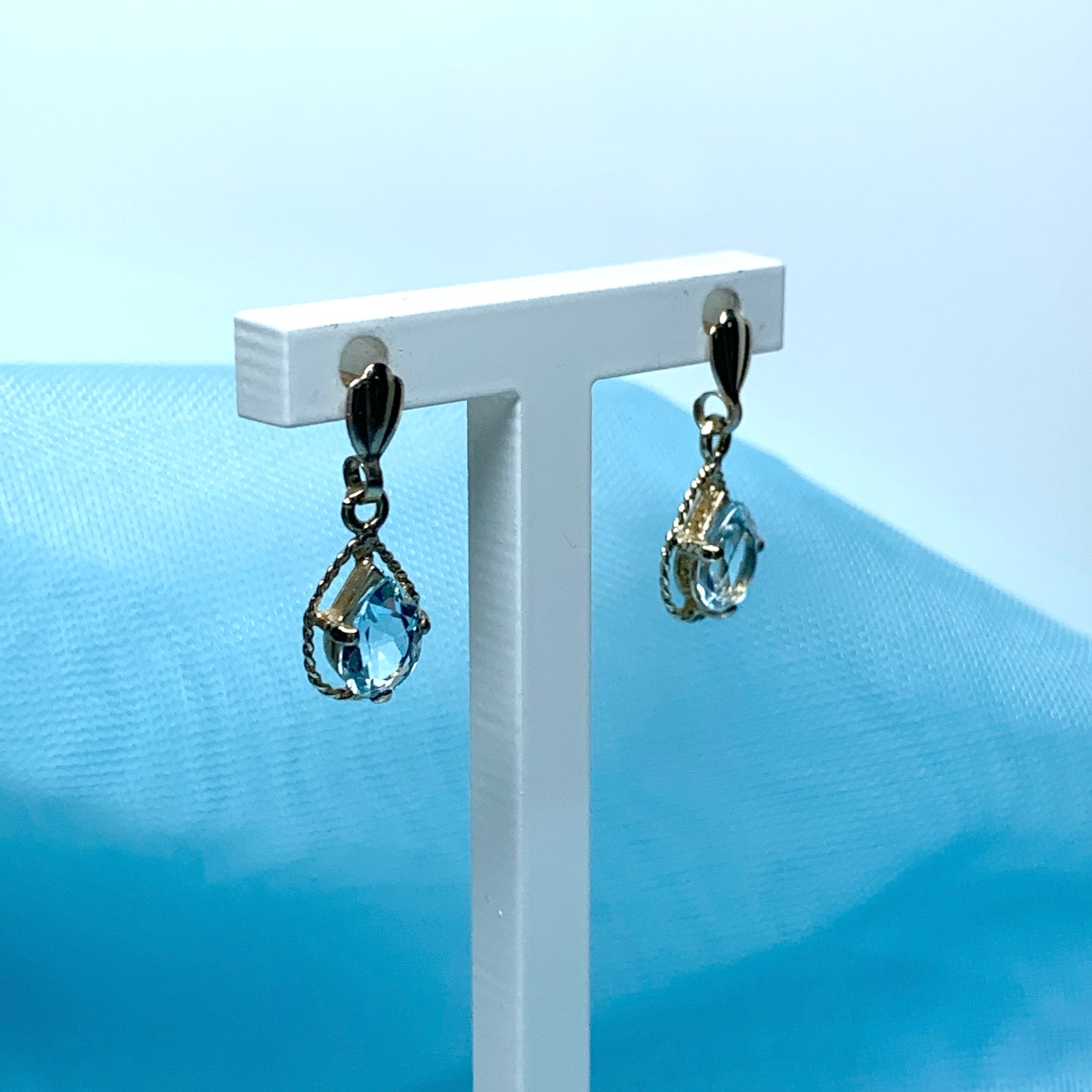 Blue topaz yellow gold oval shaped fancy drop earrings