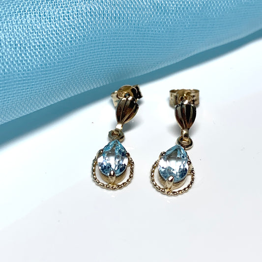 Blue topaz yellow gold oval shaped fancy drop earrings