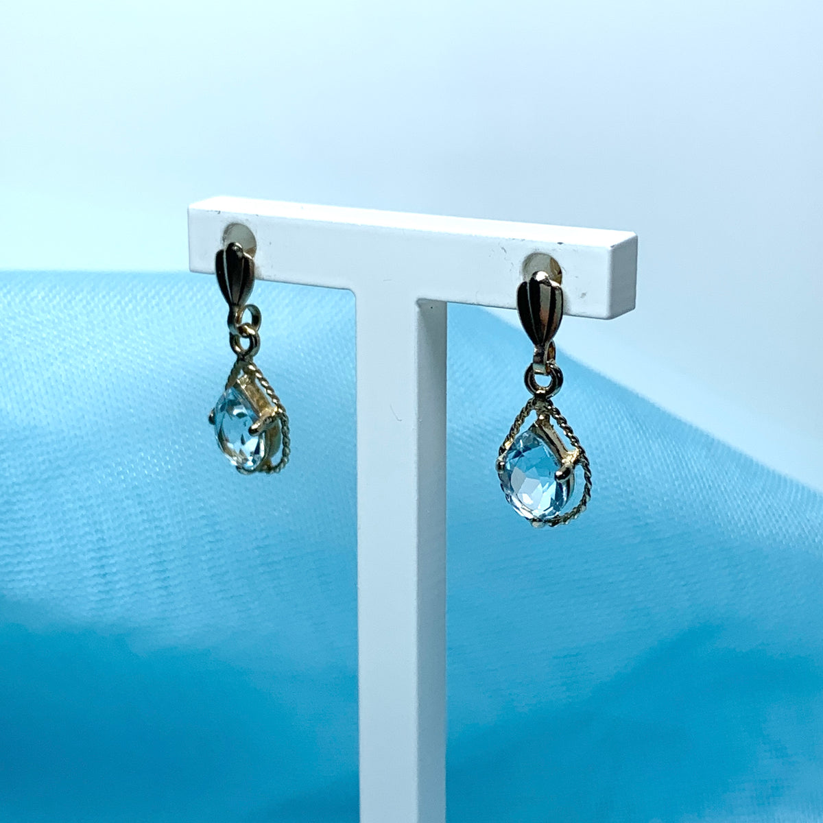 Blue topaz yellow gold oval shaped fancy drop earrings
