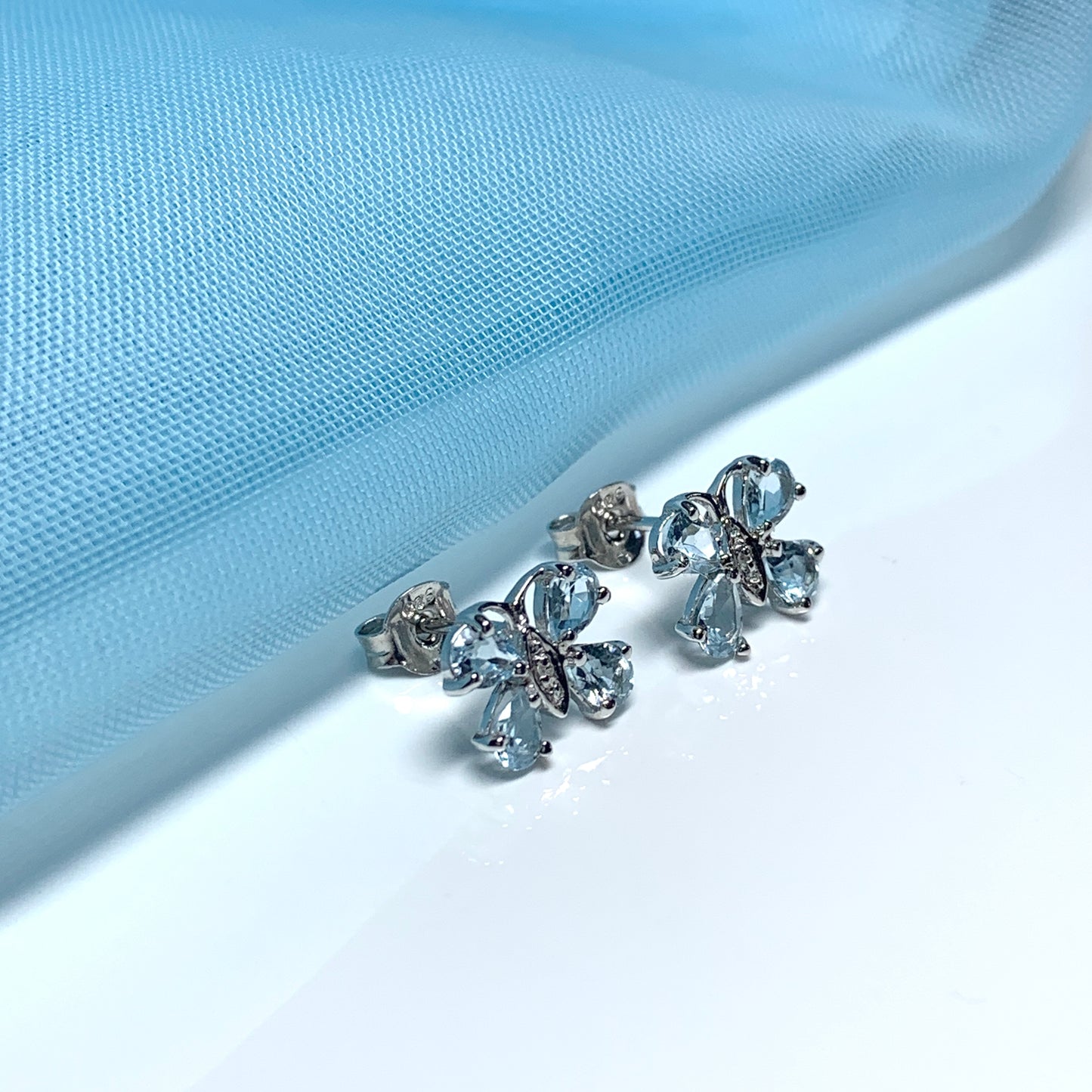 Butterfly Shaped Blue Topaz And Diamond Sterling Silver Stud Earrings