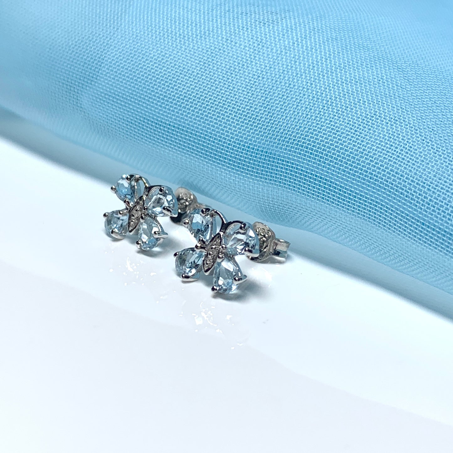 Butterfly Shaped Blue Topaz And Diamond Sterling Silver Stud Earrings