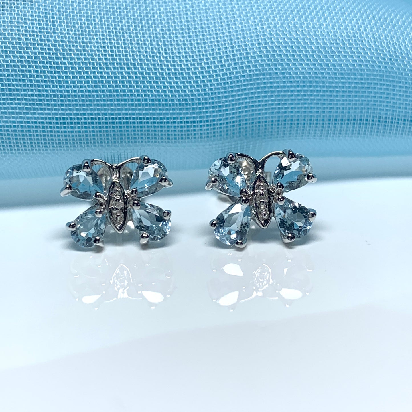 Butterfly Shaped Blue Topaz And Diamond Sterling Silver Stud Earrings