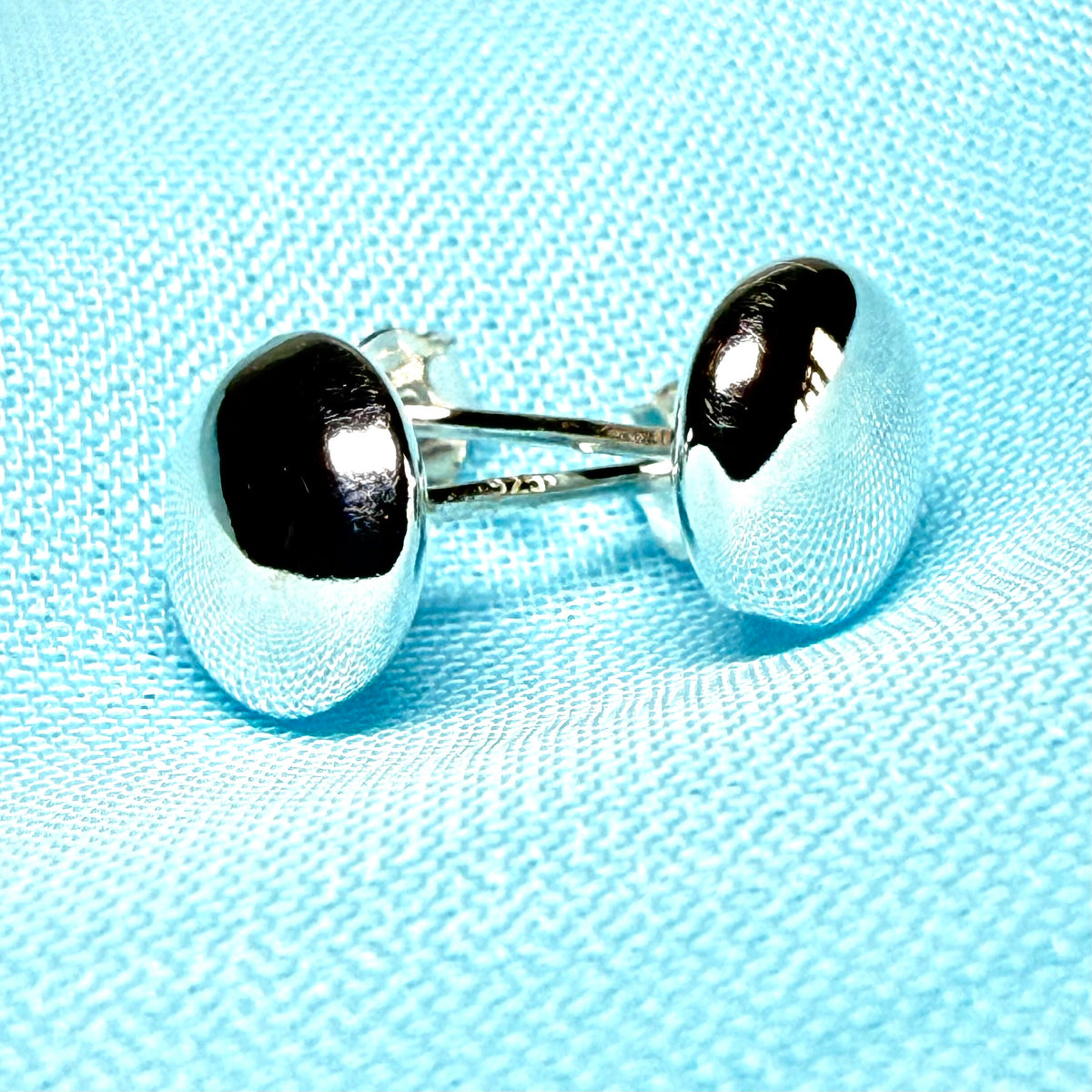 Button shaped stud earrings sterling silver, plain polished