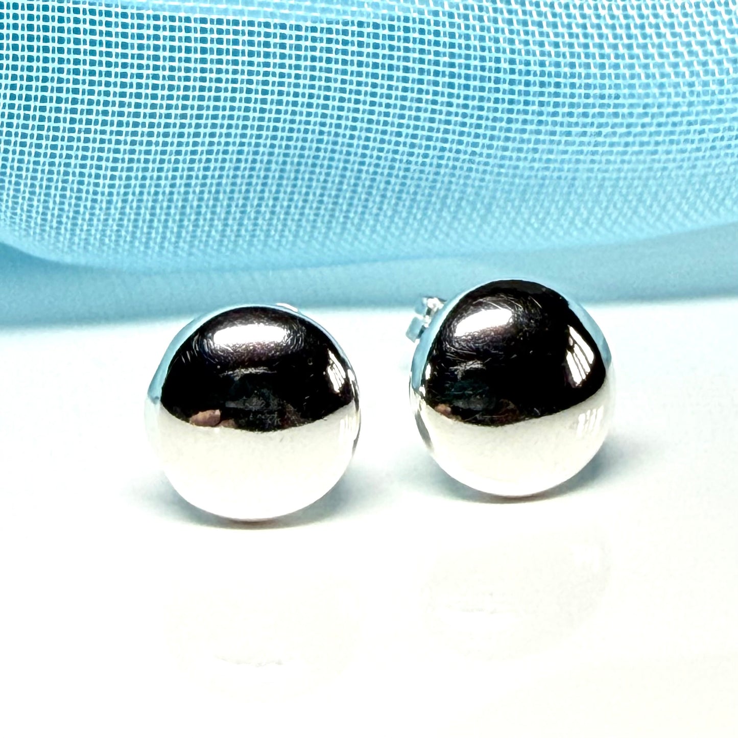 Button shaped stud earrings sterling silver, plain polished