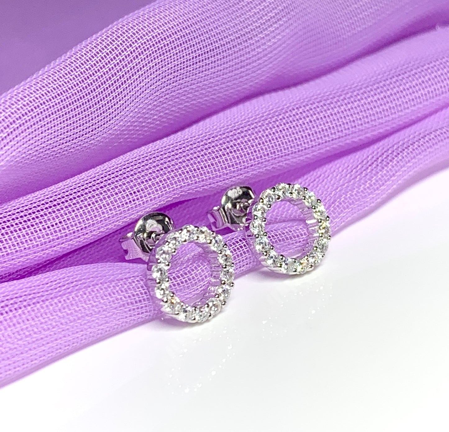 Circle of Life round cubic zirconia open circle cluster stud earrings