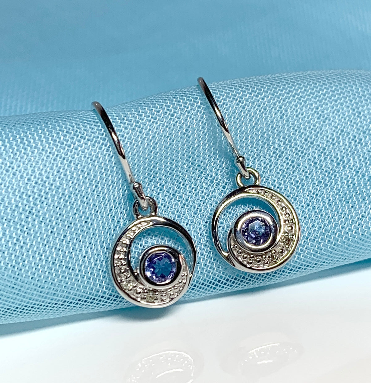 Circle tanzanite and diamond white gold drop earrings