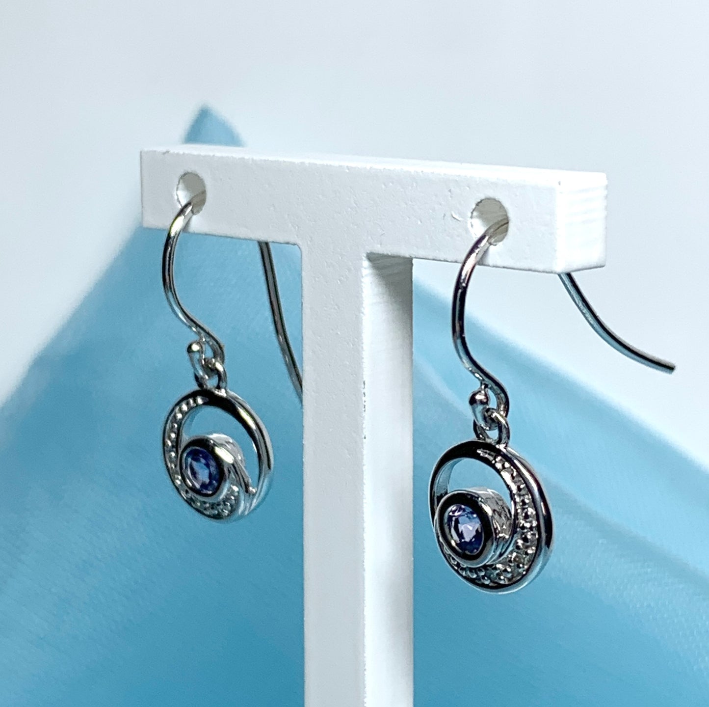 Circle tanzanite and diamond white gold drop earrings