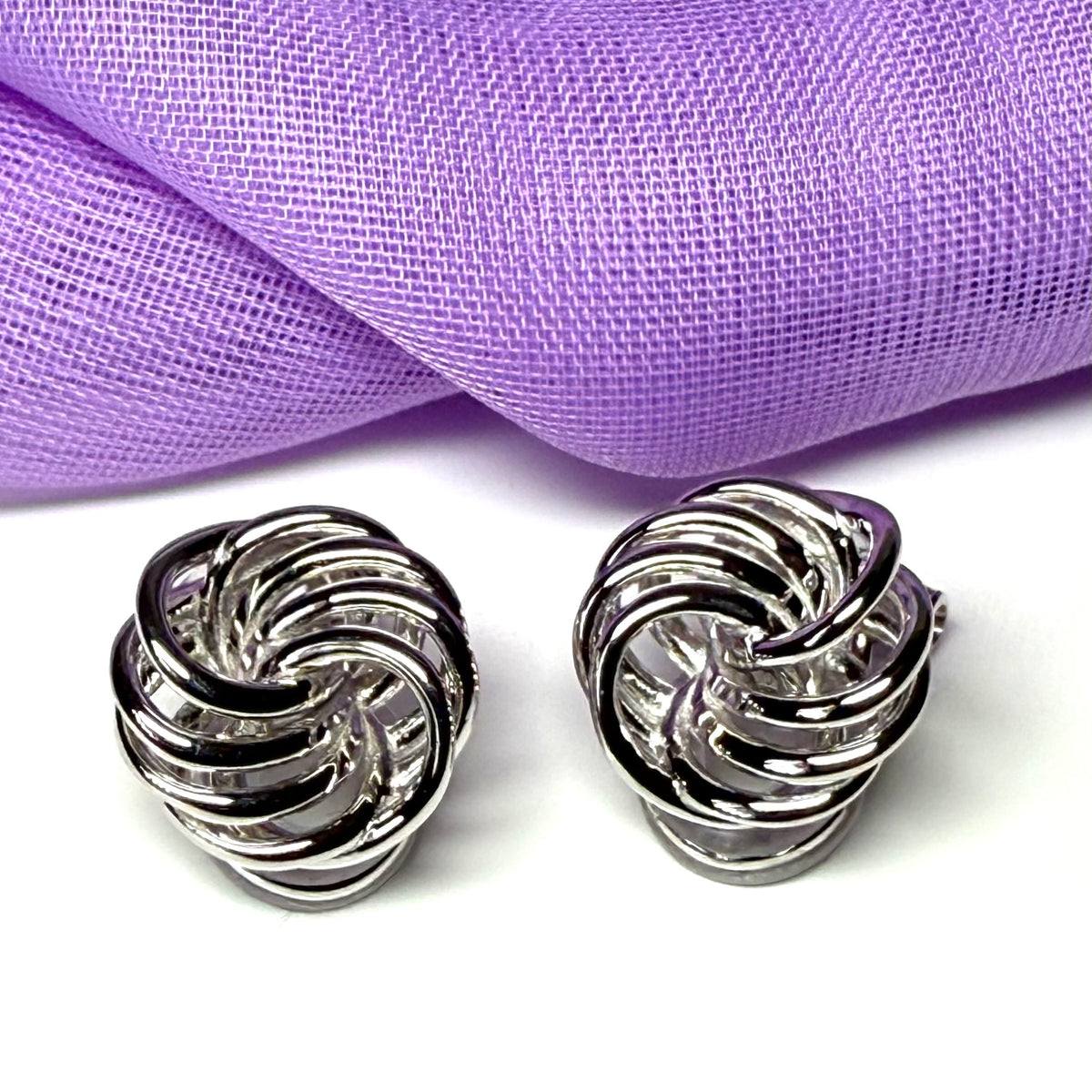 Clip on earrings sterling silver large knot swirl design