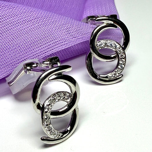 Clip on earrings sterling silver double swirl design
