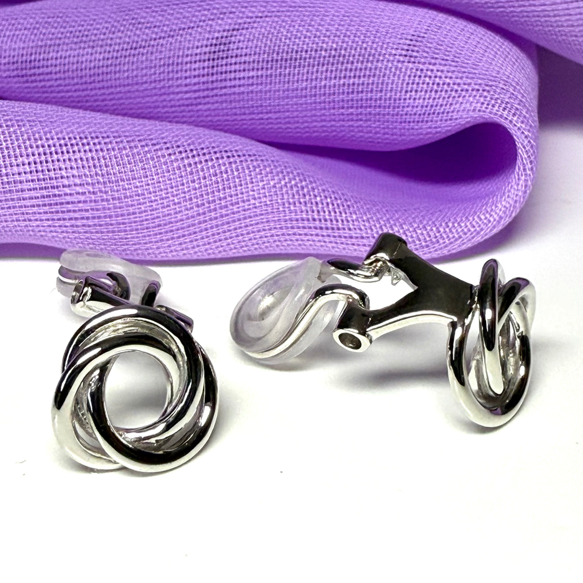 Clip on earrings sterling silver open knot design