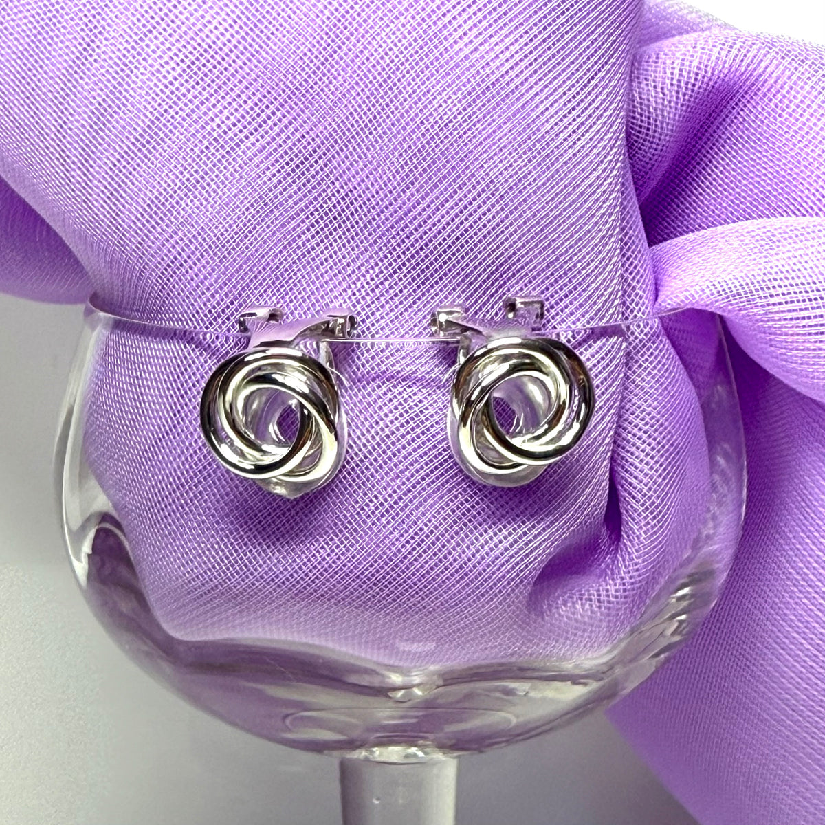 Clip on earrings sterling silver open knot design