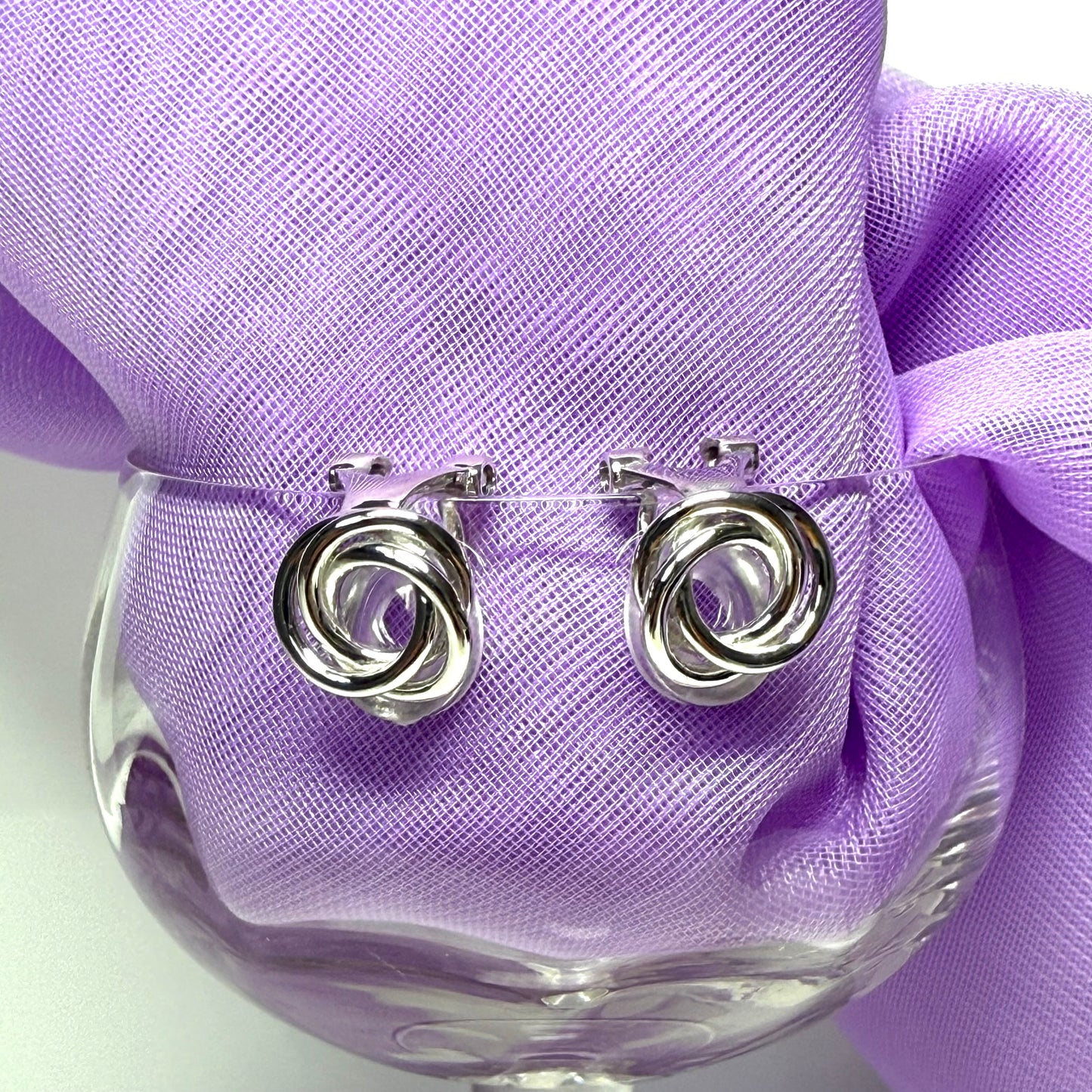 Clip on earrings sterling silver open knot design